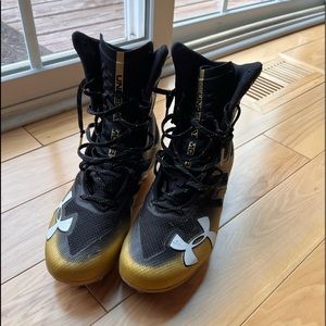 UA Highlight black/gold football cleats, mens size 8